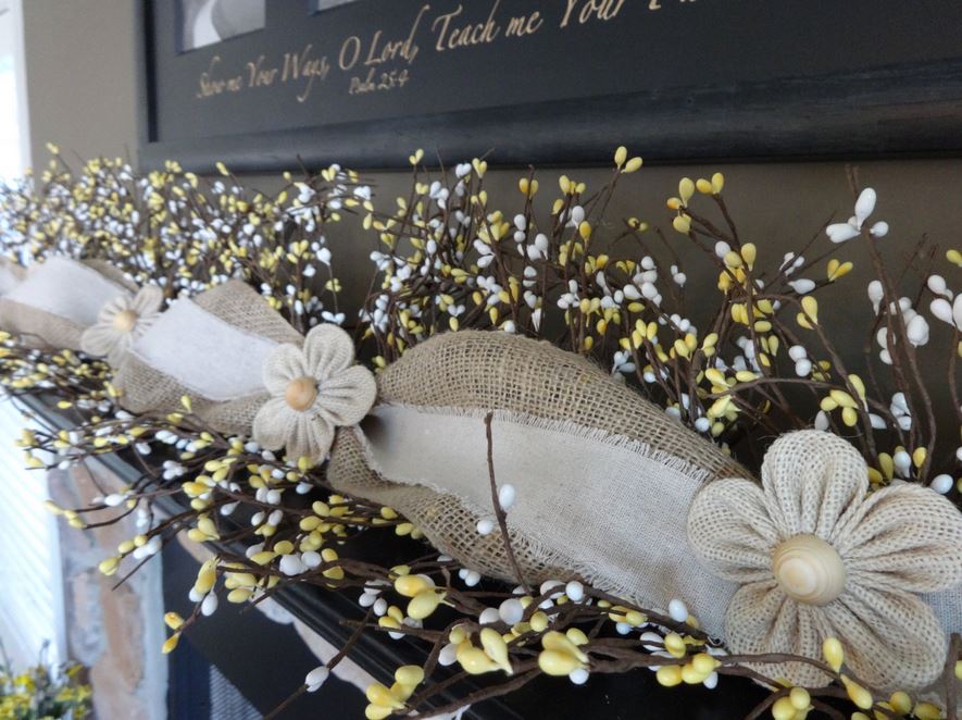 Summer garland with hessian bows and decorative wooden twigs and branches